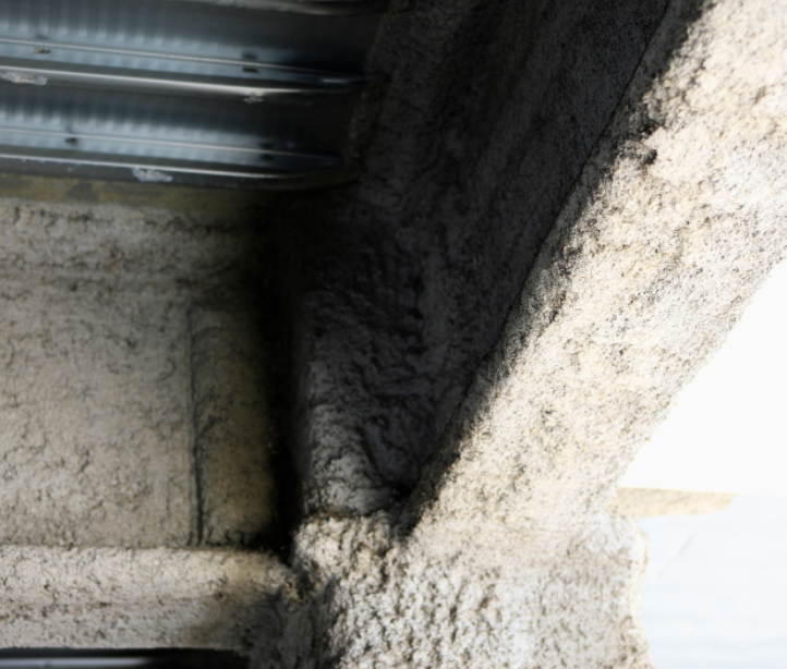 Sprayed coating with asbestos