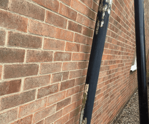 Asbestos downpipe to be removed