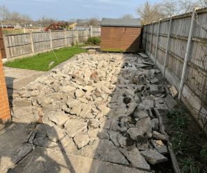 Concrete base break up and removal after asbestos garage has been removed