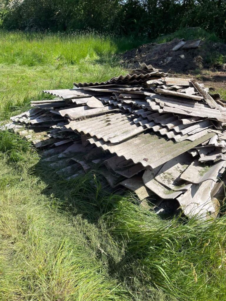asbestos collection service for asbestos debris left on farmland